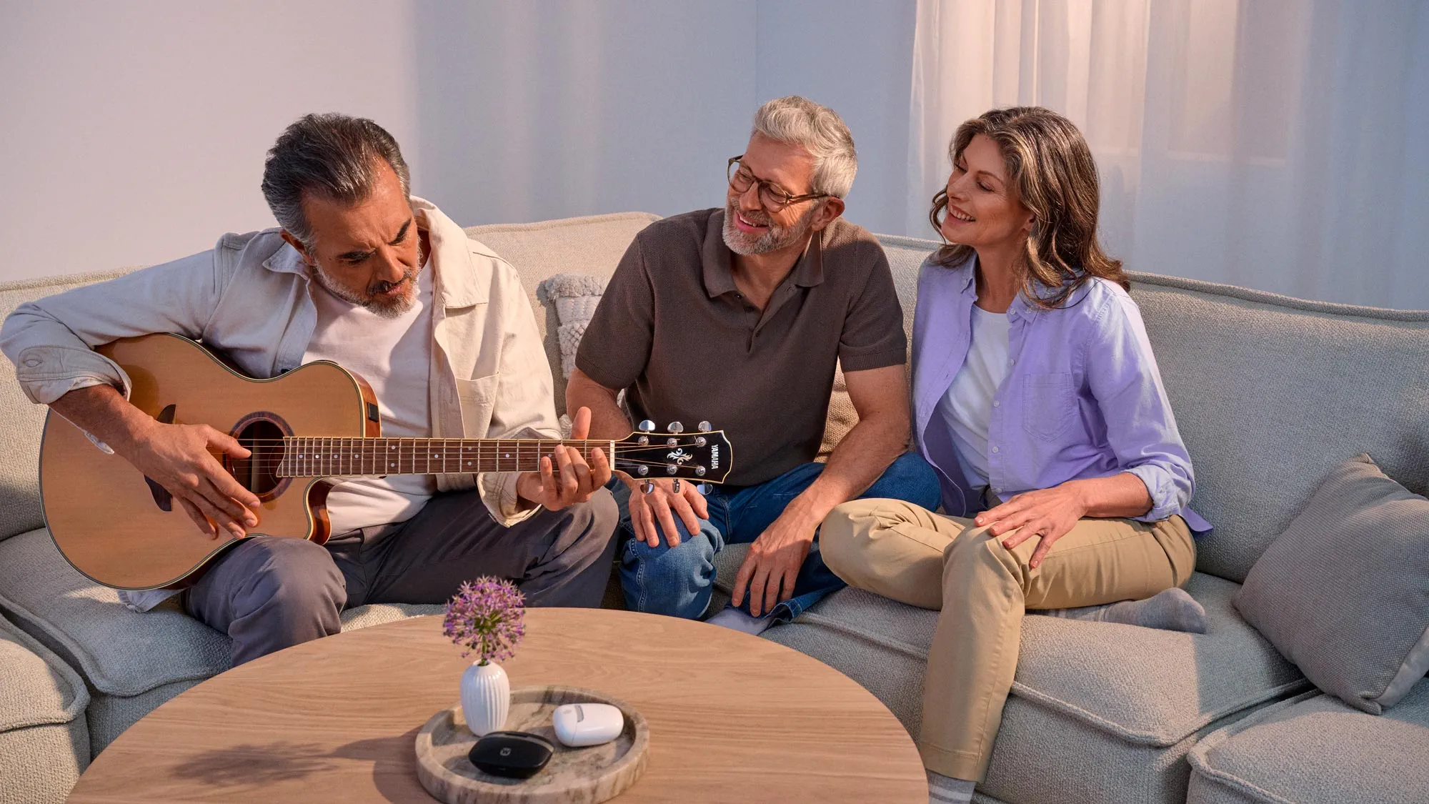 friends-guitar-captivated-hearing-aids-16x9